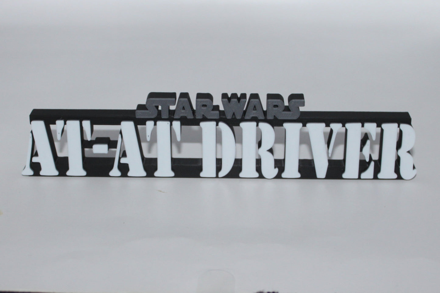 AT-AT Driver 3D printed Logo Sign Wall Desk Shelf Art