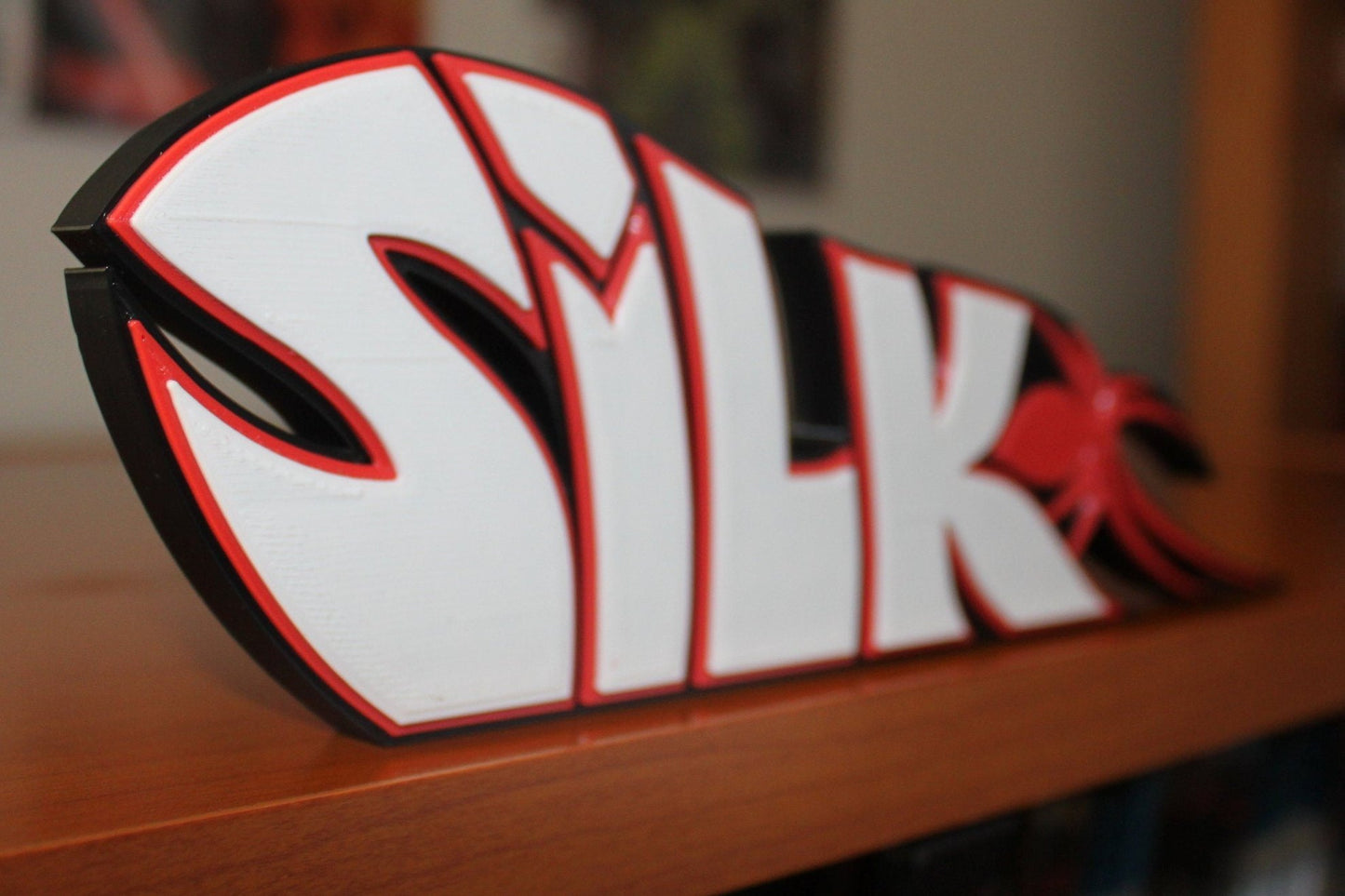 Silk 3D printed Comic Logo Art