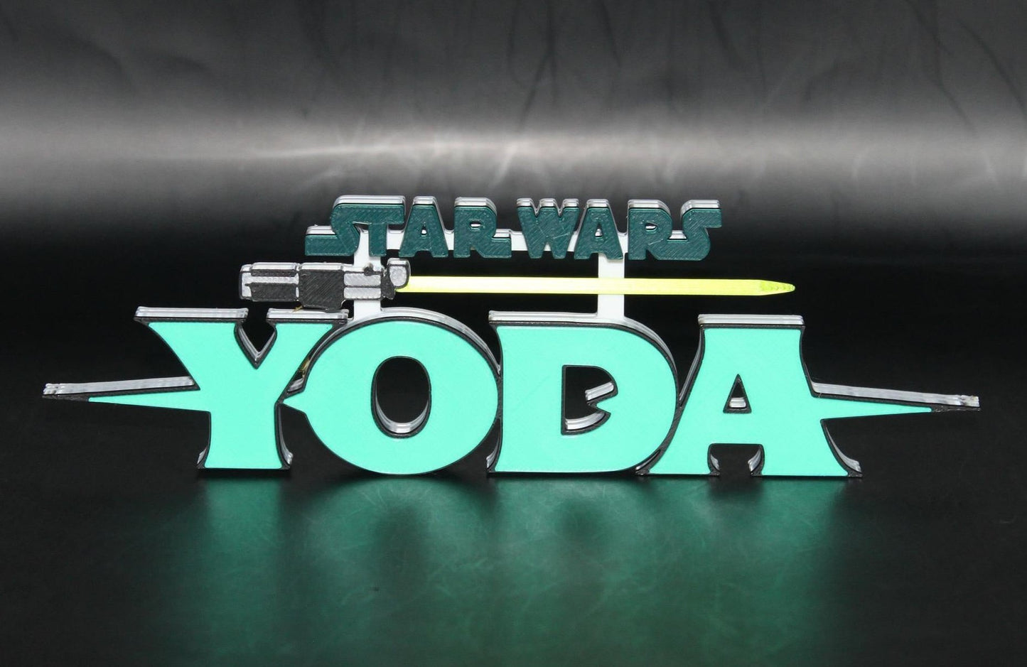 Yoda w/Lightsaber 3D printed Comic Logo Art