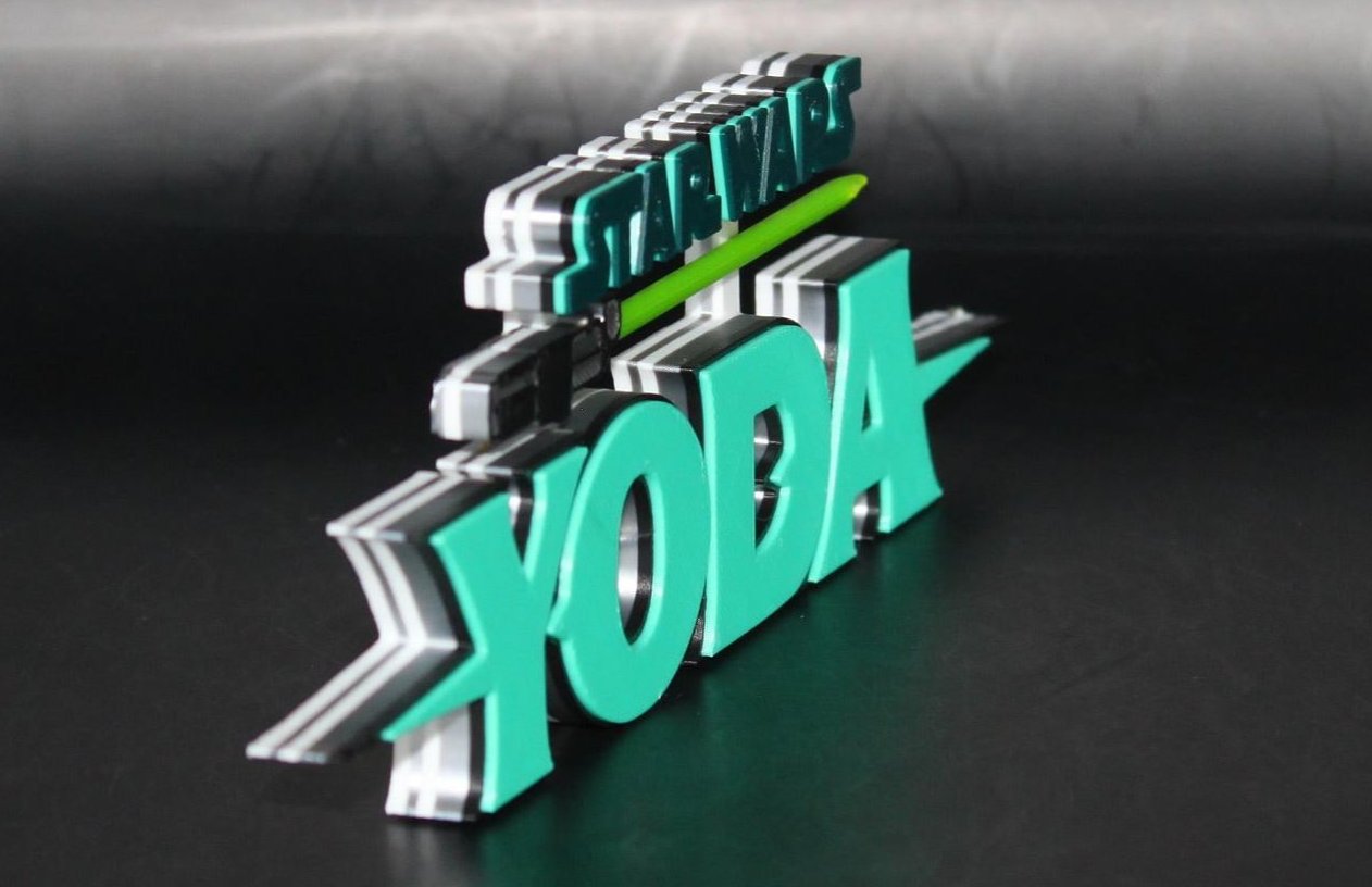 Yoda w/Lightsaber 3D printed Comic Logo Art